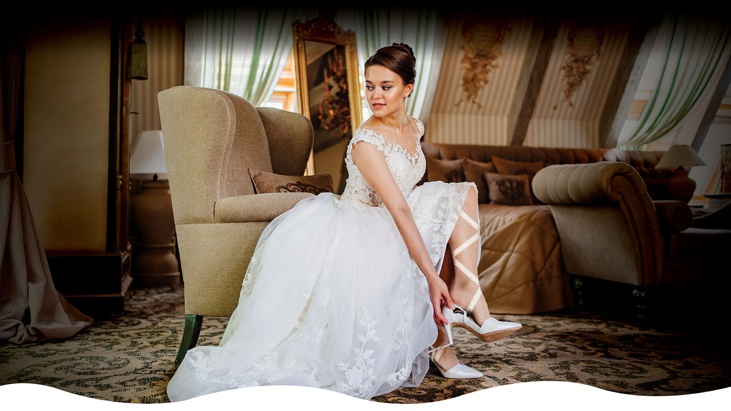 Woman in a white wedding dress sitting on a couch in a decorated room wearing The Lace white LegUps. 